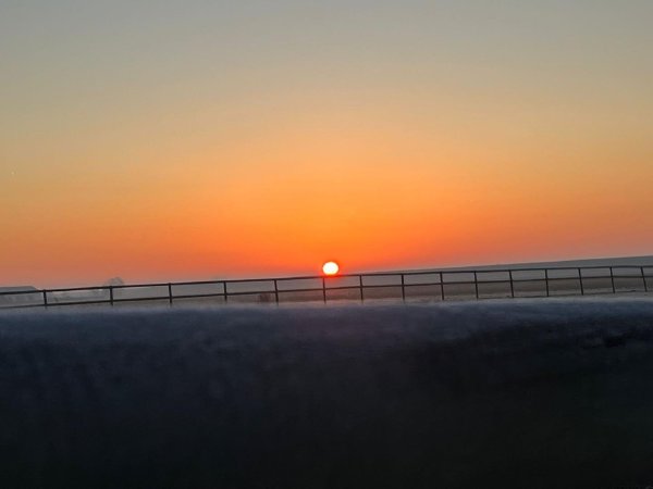 Uitzicht over de Oosterschelde bij zonsondergang